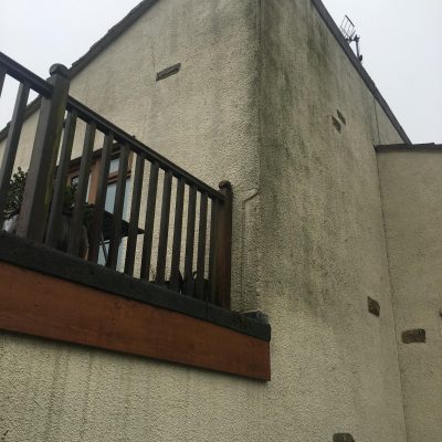 Render cleaning in Harrogate - Rendered wall half dirty