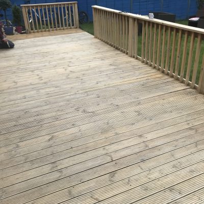 freshly cleaned grooved timber decking